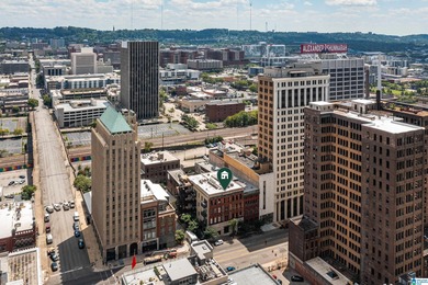 Perfectly positioned in the heart of downtown, this exceptional