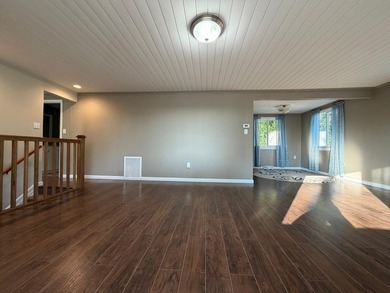 This three-bedroom, two-bathroom home sits across the bay from - photo 39