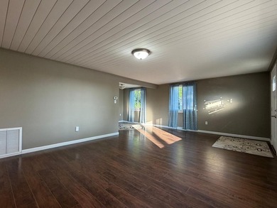 This three-bedroom, two-bathroom home sits across the bay from - photo 40