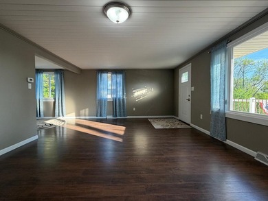 This three-bedroom, two-bathroom home sits across the bay from - photo 41