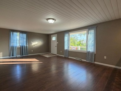 This three-bedroom, two-bathroom home sits across the bay from - photo 42