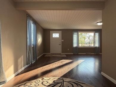 This three-bedroom, two-bathroom home sits across the bay from - photo 43