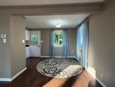 This three-bedroom, two-bathroom home sits across the bay from - photo 45