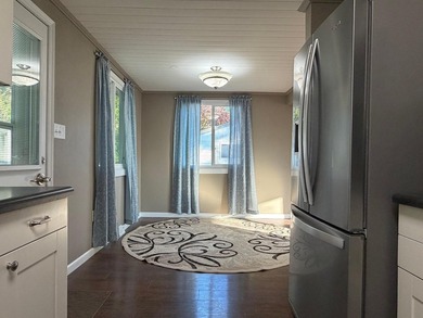 This three-bedroom, two-bathroom home sits across the bay from - photo 46