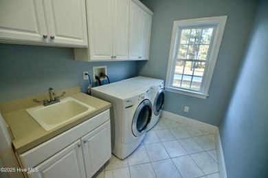 This stunning Stuart Hardy home is situated on a protective cove - photo 18