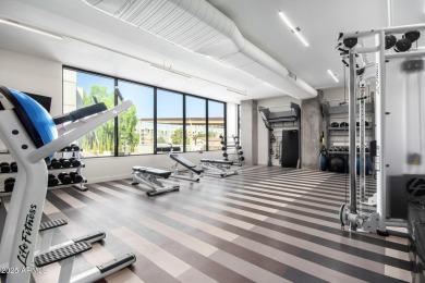 5 DEEDED garage parking spaces & 1 EV charging station & Largest