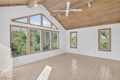 Welcome to 4400 Gulf Pines Drive, an elevated coastal home set