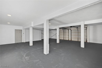 Welcome to 4400 Gulf Pines Drive, an elevated coastal home set