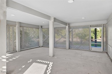 Welcome to 4400 Gulf Pines Drive, an elevated coastal home set