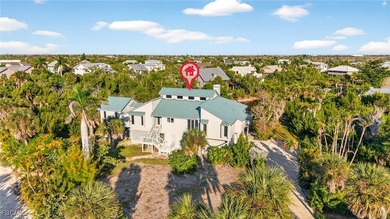 Welcome to 4400 Gulf Pines Drive, an elevated coastal home set
