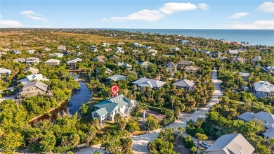 Welcome to 4400 Gulf Pines Drive, an elevated coastal home set