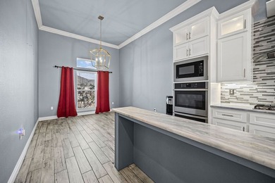 Experience luxury living in this stunning custom-built home - photo 12