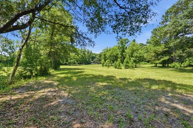 Turn down a long private driveway framed by fencing and mature - photo 26