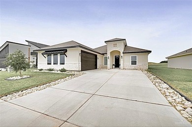 Stunning golf-course home located in a highly sought-after gated - photo 1