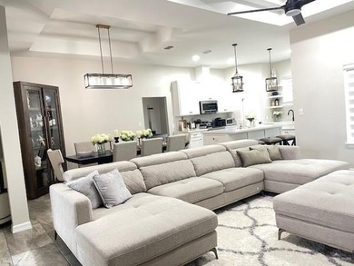Stunning golf-course home located in a highly sought-after gated - photo 3