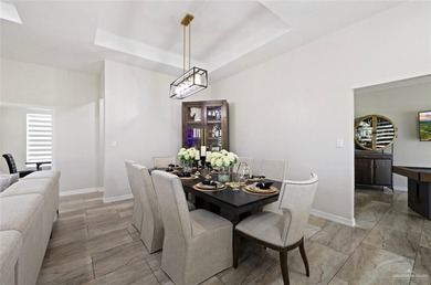 Stunning golf-course home located in a highly sought-after gated - photo 4