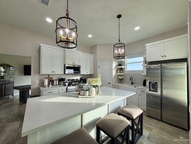 Stunning golf-course home located in a highly sought-after gated - photo 7