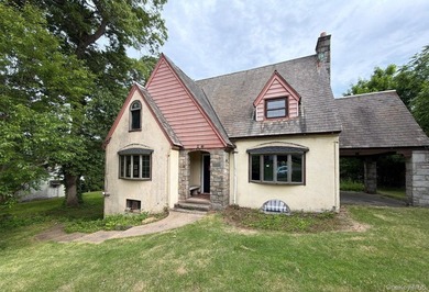 Tudor Style Home. This Home Features 4 Bedrooms, 3 Full Baths - photo 1