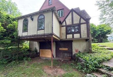 Tudor Style Home. This Home Features 4 Bedrooms, 3 Full Baths - photo 2