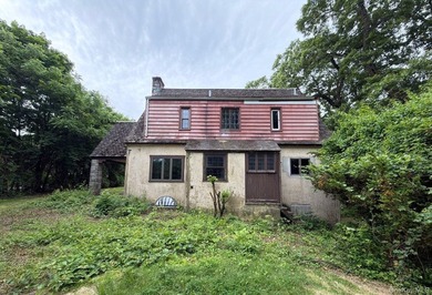 Tudor Style Home. This Home Features 4 Bedrooms, 3 Full Baths - photo 3