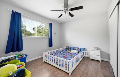 Desirable Lakewood Village featuring laminate and tile flooring - photo 13
