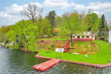 Tucked into the hillside, this awesome lakefront home offers so - photo 2
