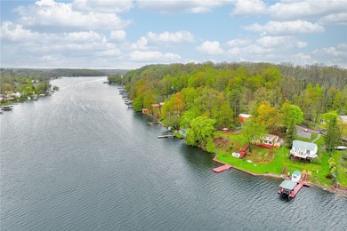 Tucked into the hillside, this awesome lakefront home offers so - photo 4