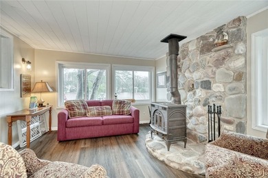 Tucked into the hillside, this awesome lakefront home offers so - photo 8