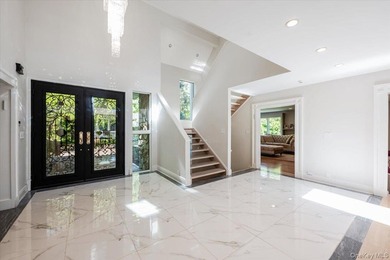 A circular driveway leads to this spectacular fully renovated - photo 3