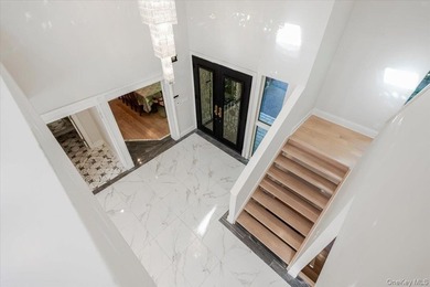 A circular driveway leads to this spectacular fully renovated - photo 4