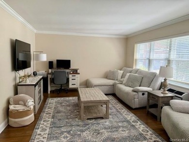 Beautiful County Club Gardens Lower Level Unit Awaits You! This - photo 2