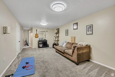 Welcome to this charming West Jordan home featuring 4 spacious