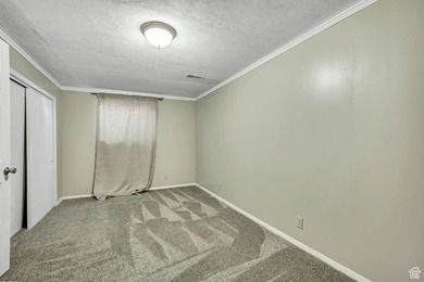 Welcome to this charming West Jordan home featuring 4 spacious