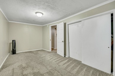 Welcome to this charming West Jordan home featuring 4 spacious