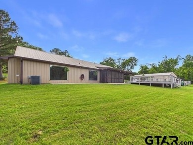 Custom steel-frame home with guest quarters, shop, pool, pond & - photo 22