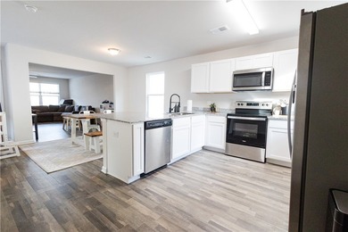 Nestled in the Palmetto Place community, this 3-bedroom, 2 - photo 2