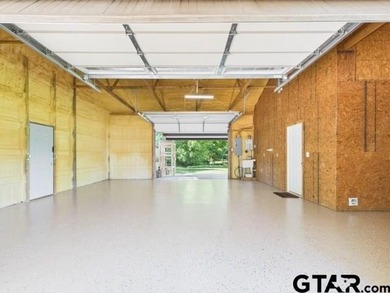 Custom steel-frame home with guest quarters, shop, pool, pond & - photo 24