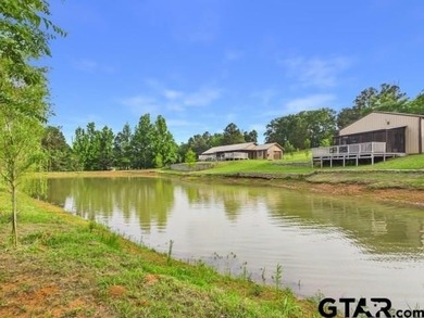 Custom steel-frame home with guest quarters, shop, pool, pond & - photo 33