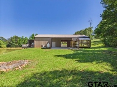 Custom steel-frame home with guest quarters, shop, pool, pond & - photo 34