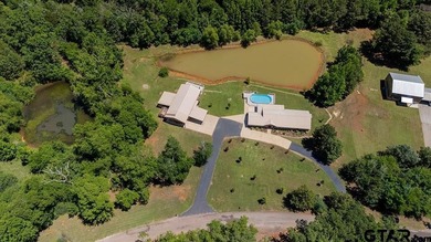 Custom steel-frame home with guest quarters, shop, pool, pond & - photo 44