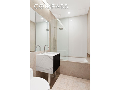 This exquisite triple-mint residence enjoys a semi-private - photo 12
