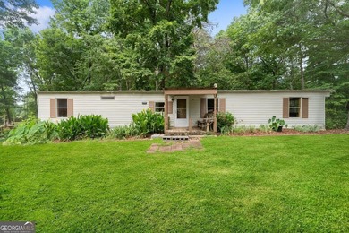 Affordable living in Dawsonville! Nestled on nearly a full acre - photo 1