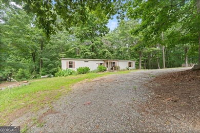 Affordable living in Dawsonville! Nestled on nearly a full acre - photo 3
