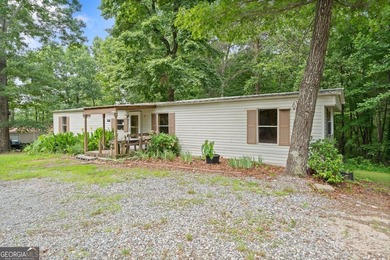 Affordable living in Dawsonville! Nestled on nearly a full acre - photo 4