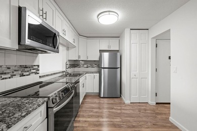 Rare opportunity to own a stunning 4th-floor corner unit in the - photo 9