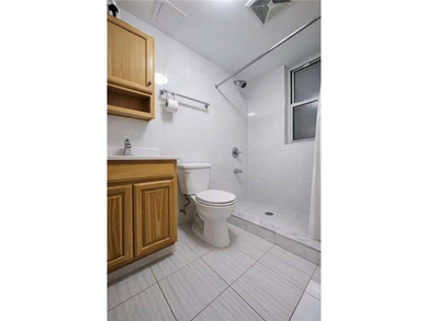 Well-maintained 3-story attached 2-family in desirable Dyker - photo 6