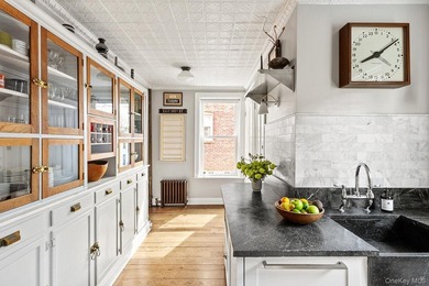 Perched above the treetops of Prospect Park, Residence 3L at 86 - photo 5