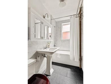 Perched above the treetops of Prospect Park, Residence 3L at 86 - photo 10