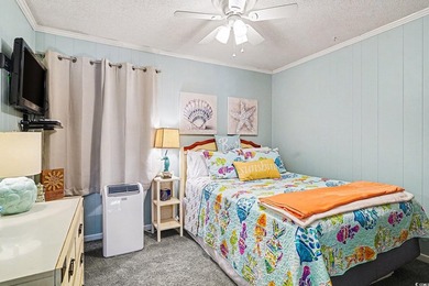 This bright two-bedroom, two-bath condominium is perched in a - photo 12
