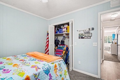 This bright two-bedroom, two-bath condominium is perched in a - photo 13